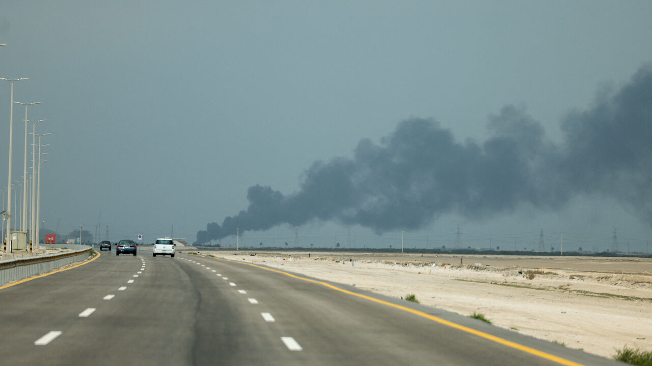 FILE PHOTO: Smoke billows from Saudi Aramco's Ras Tanura oil refinery after a reported Iranian drone strike, amid the U.S.-Israel conflict with Iran, in Ras Tanura, Saudi Arabia, March 2, 2026. REUTERS/Stringer/File Photo