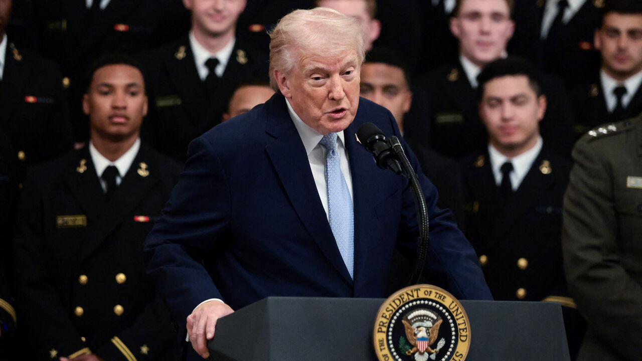 U.S. President Donald Trump delivers remarks during a presentation of the Commander-in-Chief's trophy to the U.S. Navy Midshipmen football team of the United States Naval Academy, at the White House in Washington, D.C., U.S., March 20, 2026. REUTERS/Evelyn Hockstein