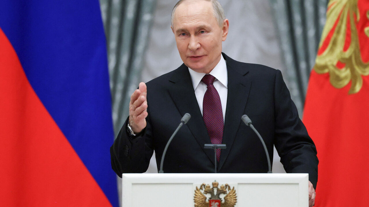 Russia's President Vladimir Putin delivers a speech during a ceremony to award members of the Russian Paralympic team, who took part in the 2026 Winter Paralympics in Italy, at the Kremlin in Moscow, Russia, March 19, 2026. Sputnik/Vyacheslav Prokofyev/Pool via REUTERS