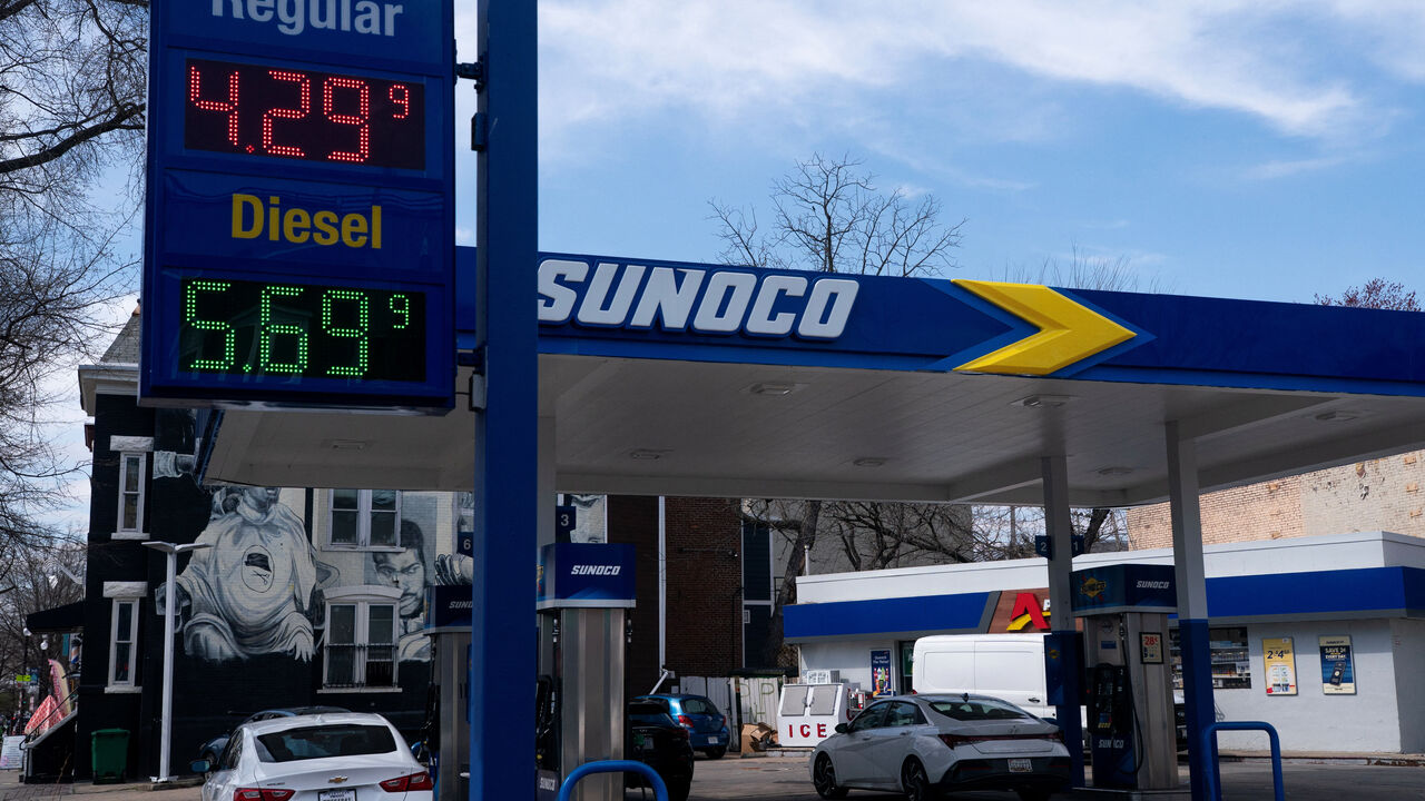 Prices are seen at a gas station on Capitol Hill amid the U.S.-Israeli war with Iran, in Washington, D.C., U.S., March 19, 2026. REUTERS/Nathan Howard