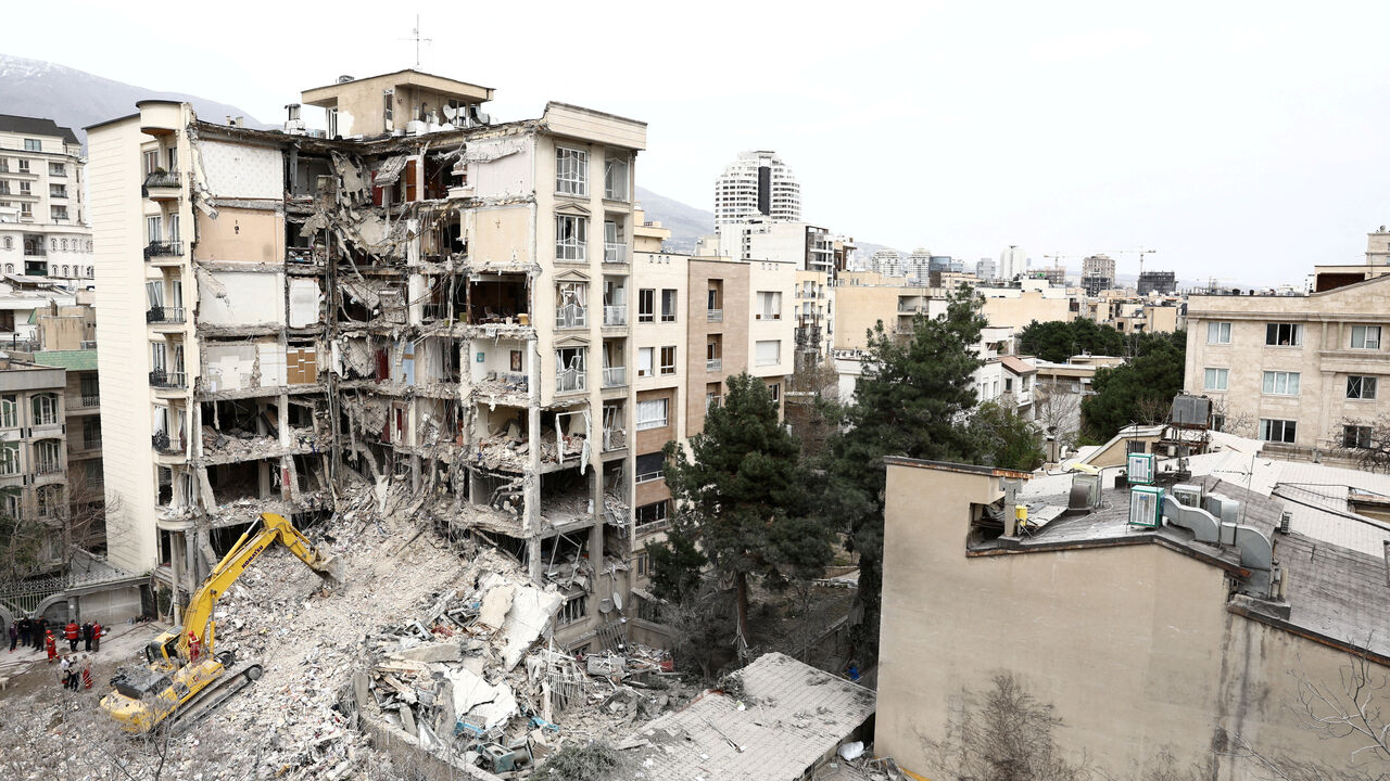 A view of a residential building that was damaged by a strike, amid the U.S.-Israeli conflict with Iran, in Tehran, Iran, March 23, 2026. Majid Asgaripour/WANA (West Asia News Agency) via REUTERS
