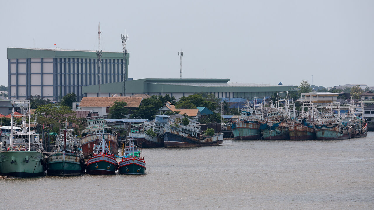 Trawlers are docked at a pier as rising diesel prices make fishing operations unprofitable, in Samut Sakhon province, Thailand, March 25, 2026. REUTERS/Chalinee Thirasupa
