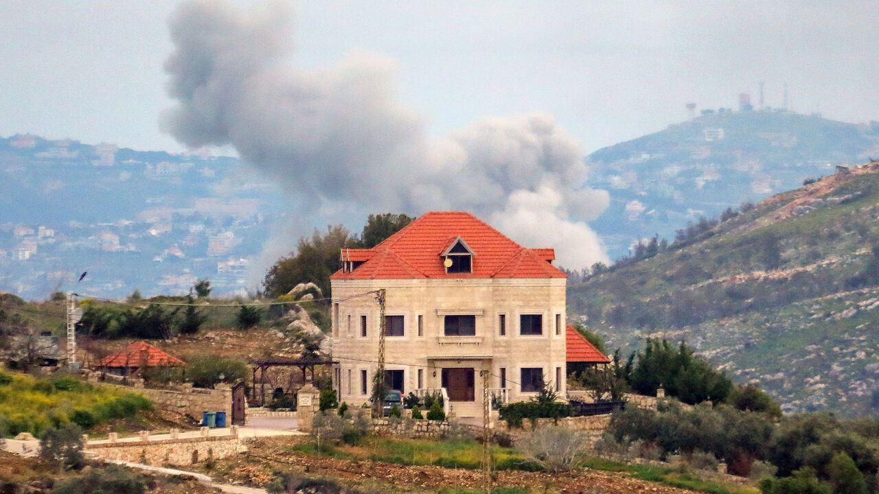 Smoke rises after an Israeli strike, amid escalating hostilities between Israel and Hezbollah, as the U.S.-Israeli conflict with Iran continues, in southern Lebanon, March 25, 2026. REUTERS/Stringer
