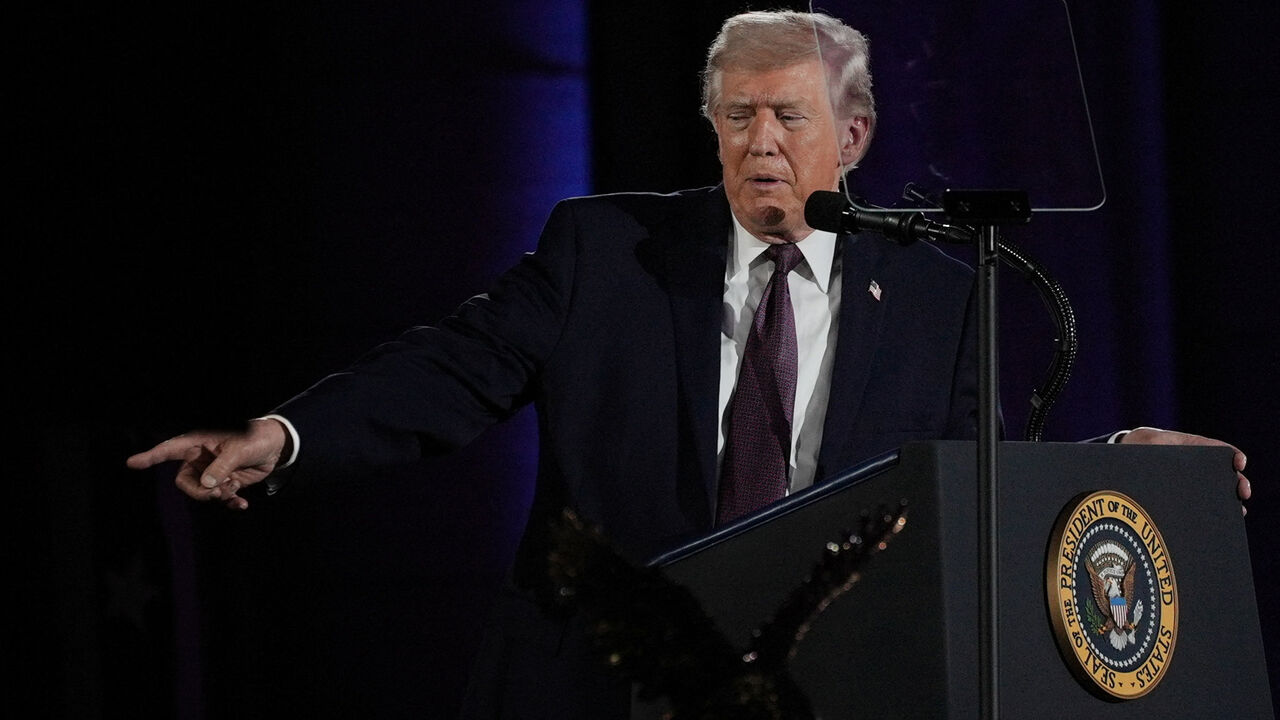 U.S. President Donald Trump points as he delivers a speech during the National Republican Congressional Committee (NRCC) annual fundraising dinner in Washington, D.C., U.S., March 25, 2026. REUTERS/Ken Cedeno