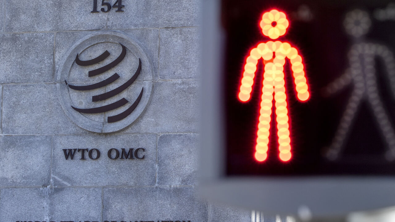 A logo is seen at the World Trade Organization (WTO) headquarters before a news conference in Geneva, Switzerland, October 5, 2022. REUTERS/Denis Balibouse
