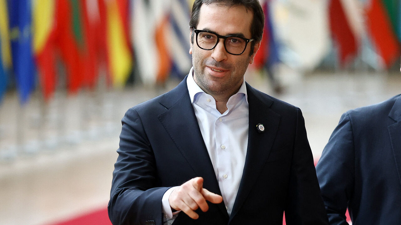 FILE PHOTO: Spanish Economy Minister Carlos Cuerpo gestures on the day of a Eurogroup Finance Ministers meeting in Brussels, Belgium December 11, 2025. REUTERS/Yves Herman/File Photo