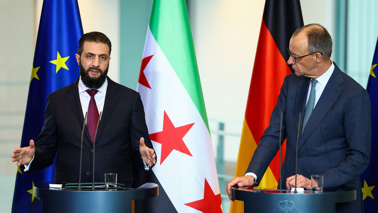 German Chancellor Friedrich Merz and Syrian President Ahmed al-Sharaa hold a press conference at the Chancellery, in Berlin, Germany March 30, 2026. REUTERS/Lisi Niesner