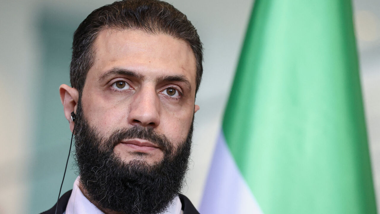 Syrian President Ahmed al-Sharaa speaks as he holds a press conference with German Chancellor Friedrich Merz at the Chancellery, in Berlin, Germany, March 30, 2026. REUTERS/Nadja Wohlleben/File Photo