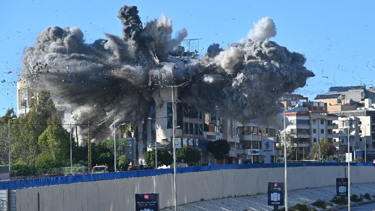 The strike hit a building next to the road connecting Beirut to the country's only international airport