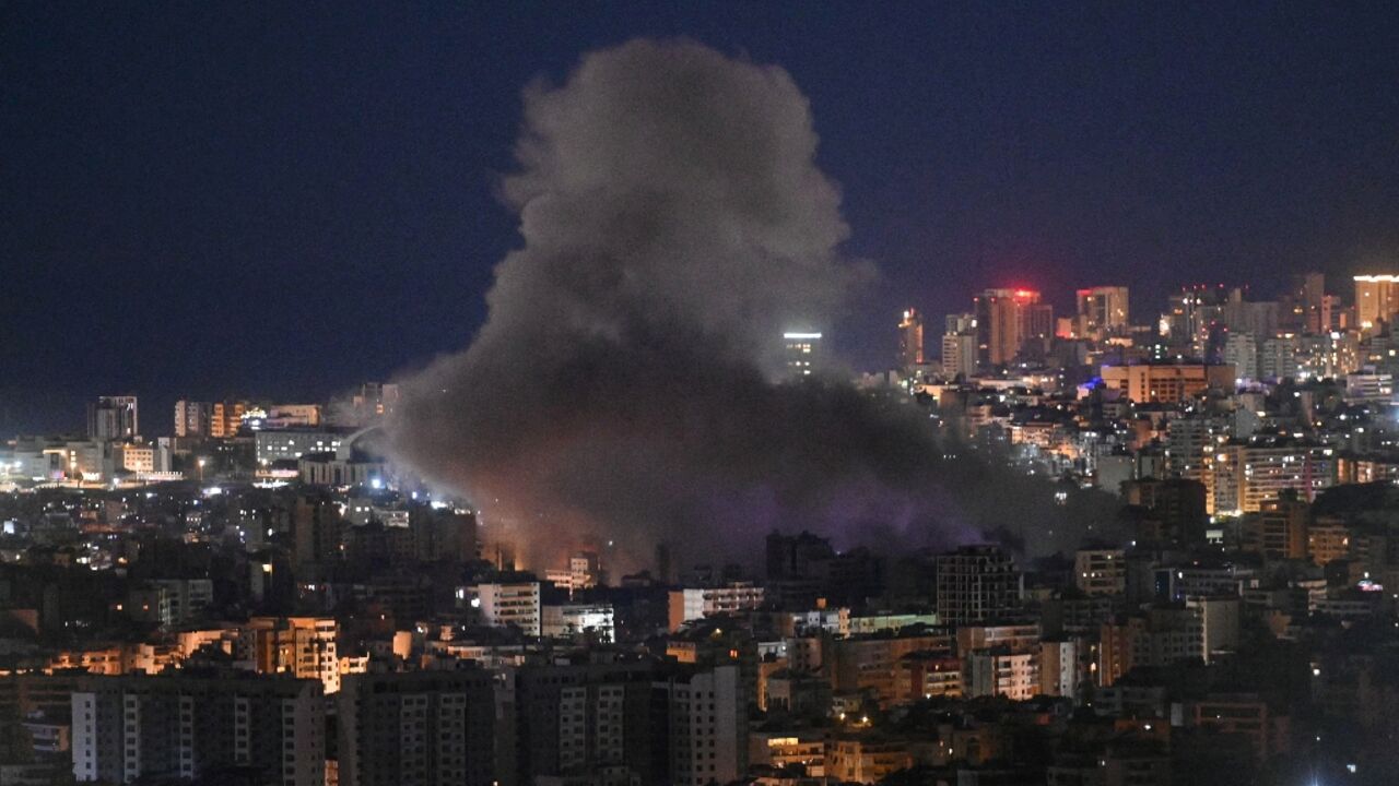 Smoke rises from the site of an Israeli airstrike that targeted an area in Beirut's southern neighborhood