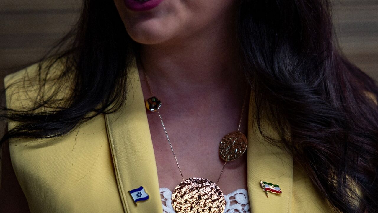 Sahar Saidian wore two pins on her lapel -- an Israeli flag and an Iranian flag from before the 1979 Islamic Revolution