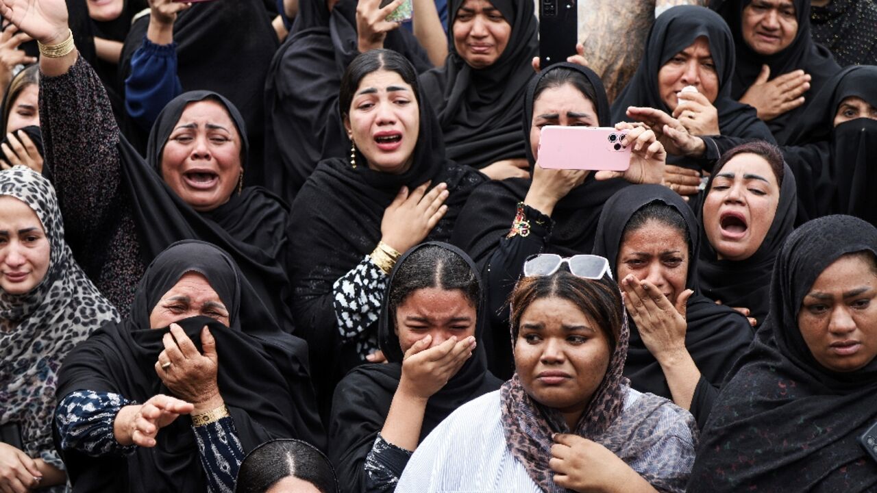 Iran's ISNA news agency released images of mourners at the funeral of children killed in the strike
