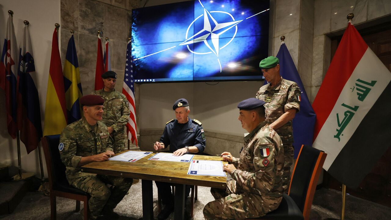 A handing over of command ceremony at Union III Camp in the Green Zone of the Iraqi capital, Baghdad, on May 22, 2025. 