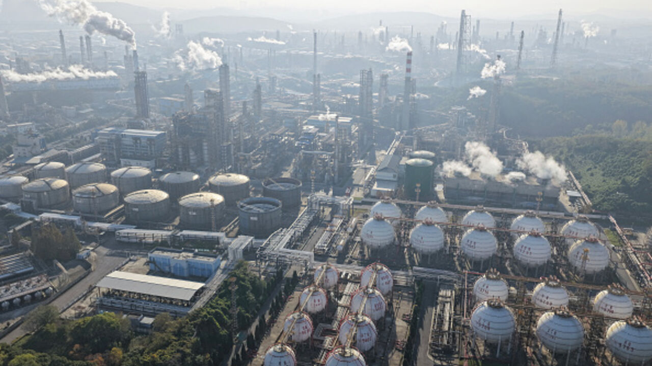 An aerial view shows a petrochemical plant in operation by the Yangtze River in Nanjing, in eastern China's Jiangsu province November 26, 2025. (Photo by CN-STR / AFP via Getty Images) / China OUT