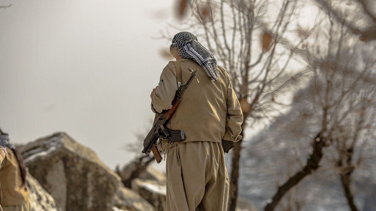 A member of the Kurdistan Democratic Party of Iran (KDPI) participates in a military drill in an outpost near Erbil, Kurdistan region of Iraq on Jan. 15, 2026.