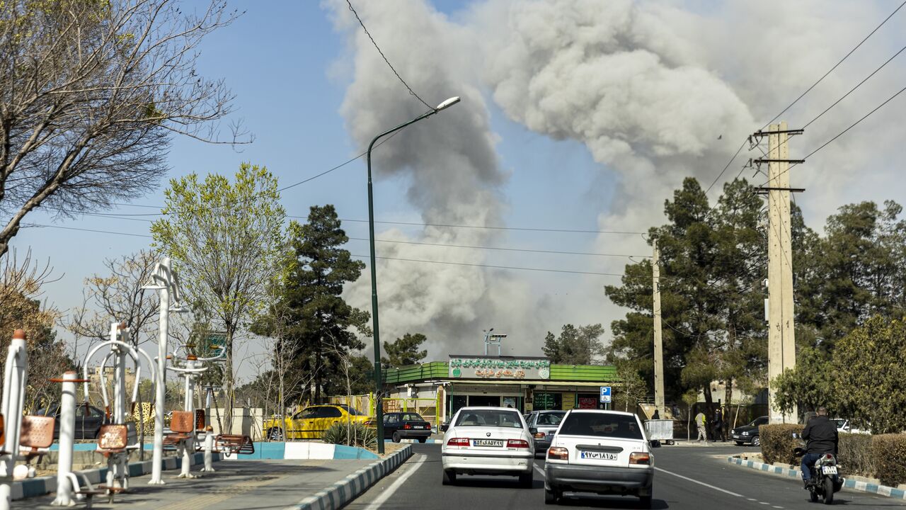 Plumes of smoke rise following an explosion on March 5, 2026, in Tehran, Iran.