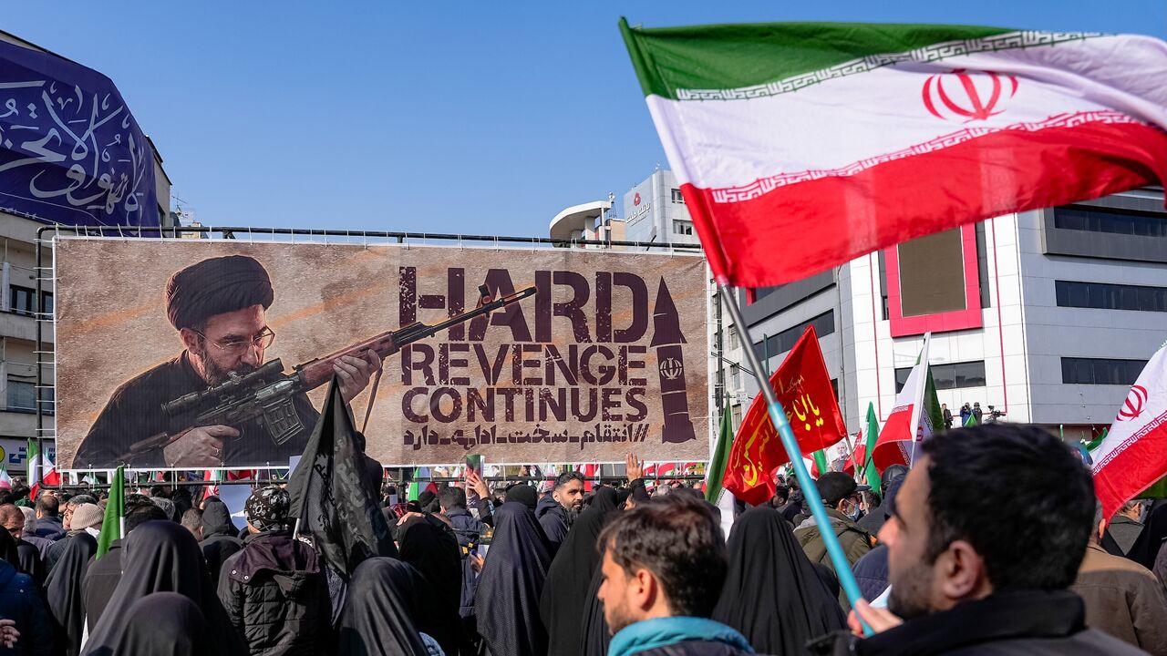 A banner depicting Ayatollah Mojtaba Khamenei, Iran's new supreme leader and son of slain leader Ayatollah Ali Khamenei, is displayed on Enghelab (Revolution) Square, Tehran, as people gather for the funerals of commanders from the Islamic Revolutionary Guard Corps, the army and others killed in US and Israeli strikes on Iran, March 11, 2026.