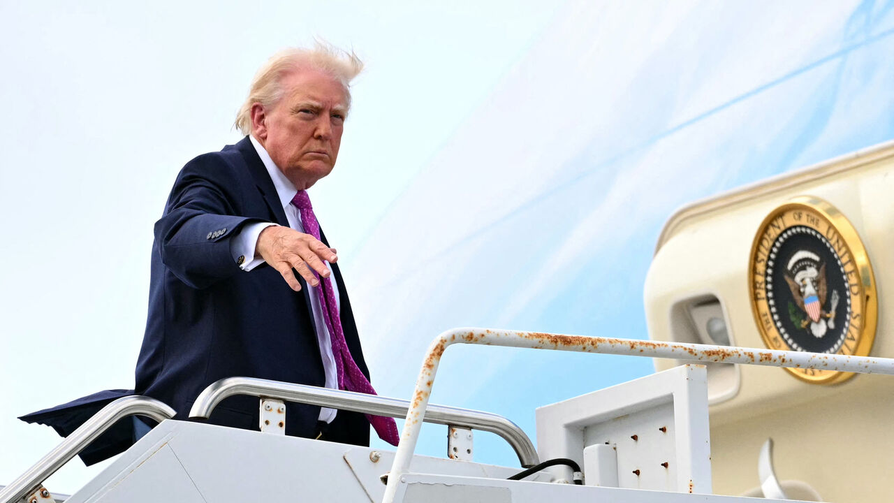 US President Donald Trump boards Air Force One prior to departure from Palm Beach International Airport in West Palm Beach, Florida, March 29, 2026. US President Donald Trump is returning to the White House after spending the weekend at his Mar-a-Lago residence. (Photo by Mandel NGAN / AFP via Getty Images)