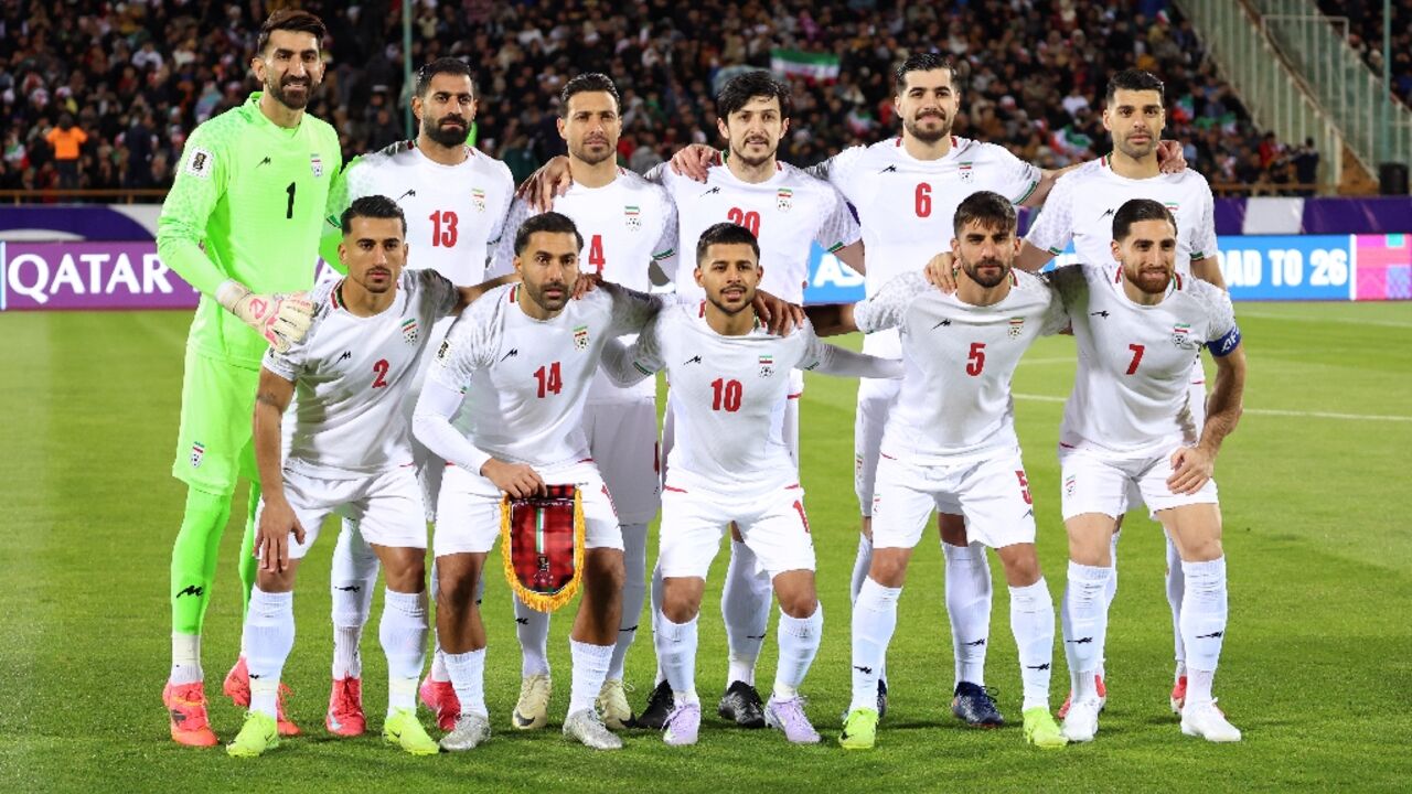 The Iran team poses for a photo before a World Cup qualifier against Uzbekistan in Tehran in March last year