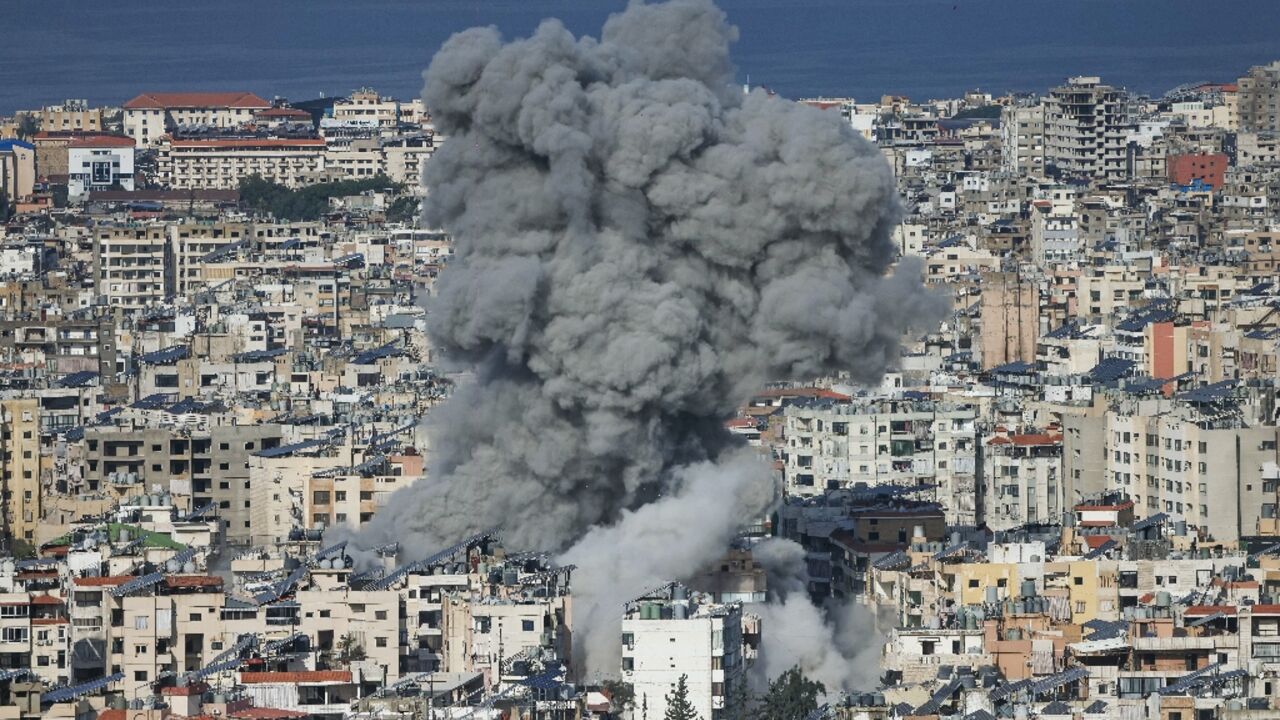 Smoke rises from the site of an Israeli air strike in the southern suburbs of Beirut