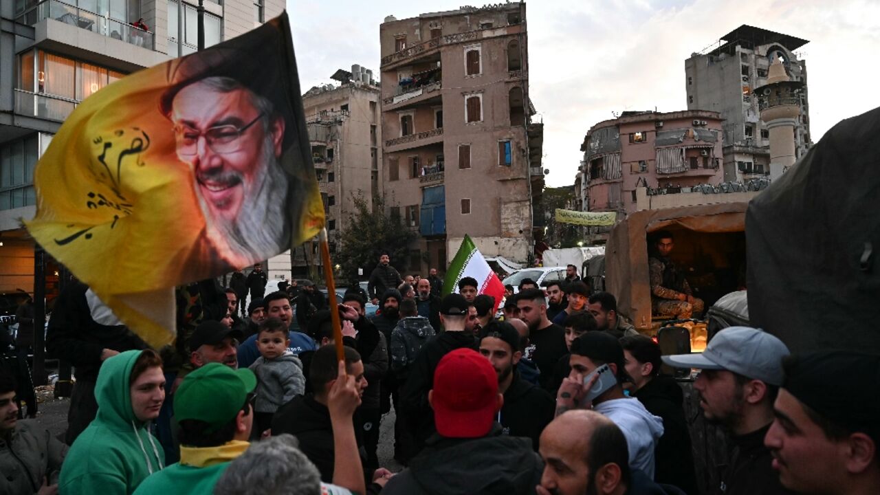 Hezbollah supporters in Beirut protest the Lebanese government's decision to engage in direct negotiations with Israel