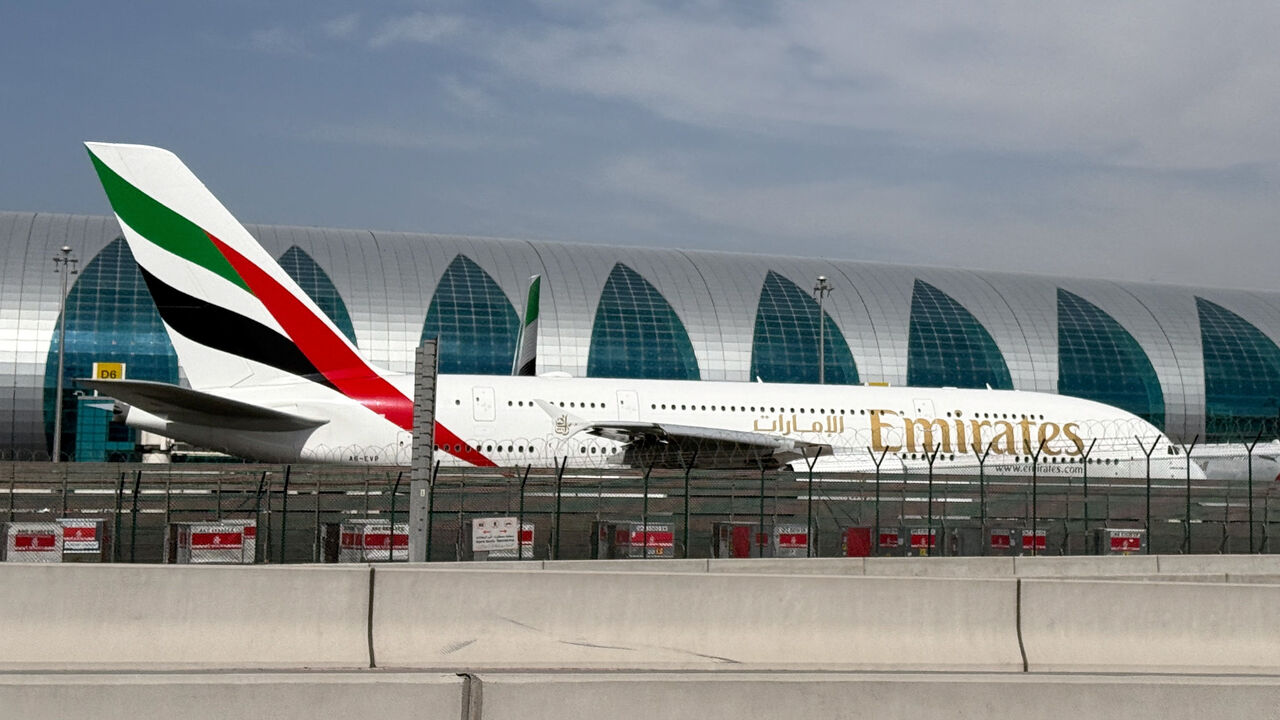 An Emirates airplane at Dubai International Airport, amid the U.S.-Israeli conflict with Iran, in Dubai, United Arab Emirates, March 7, 2026. REUTERS/Stringer
