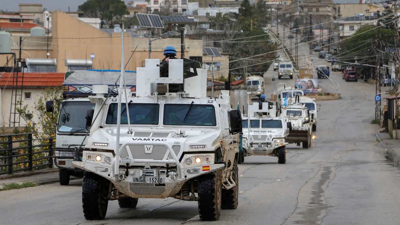 FILE PHOTO: UNIFIL vehicles drive on a main road in Qlayaa, amid escalating hostilities between Israel and Hezbollah, as the U.S.-Israel conflict with Iran continues, in Qlayaa, southern Lebanon, March 27, 2026. REUTERS/Karamallah Daher//File Photo