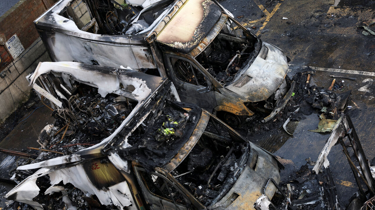 Charred remains of ambulances belonging to Hatzola, a Jewish community organisation, which were set on fire in an incident that the police say is being treated as an antisemitic hate crime, in northwest London, Britain, March 23, 2026. REUTERS/Hannah McKay
