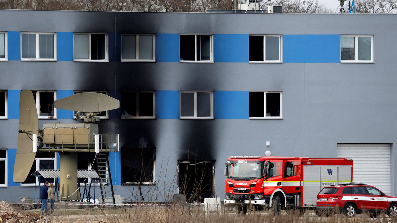 FILE PHOTO: A firetruck stands in front of a burned production hall at an industrial area in Pardubice, Czech Republic, March 20, 2026. REUTERS/David W Cerny/File Photo