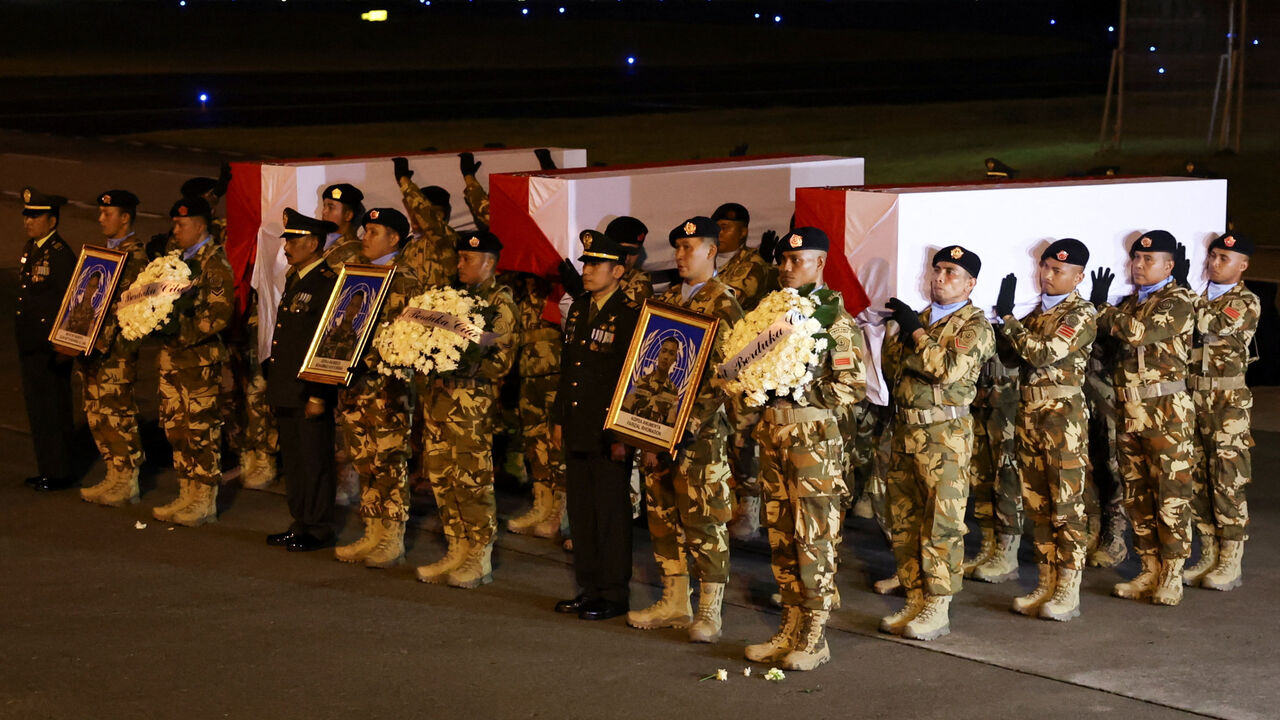 Indonesian military personnel carry coffins of United Nations Interim Force in Lebanon (UNIFIL) peacekeepers killed in Lebanon, during a military honour ceremony at Soekarno-Hatta International Airport, in Tangerang, on the outskirts of Jakarta, Indonesia, April 4, 2026. REUTERS/Ajeng Dinar Ulfiana
