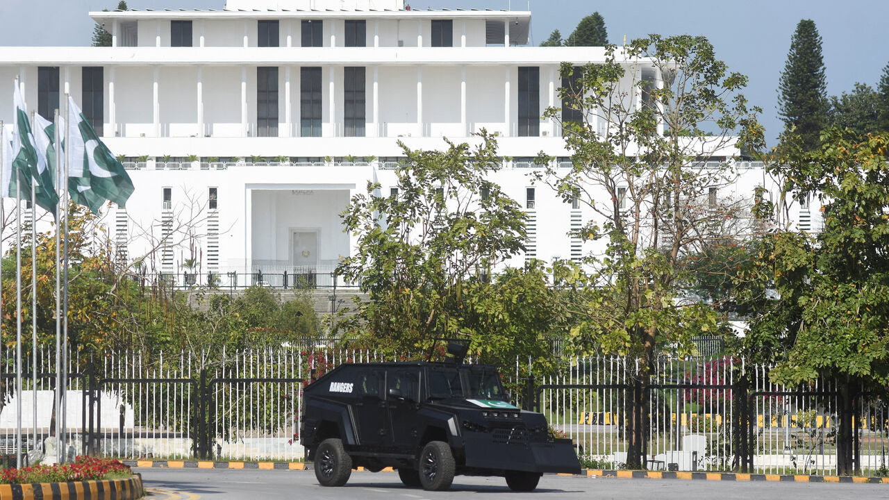 A security vehicle moves past the President house as Pakistan gears up to host the U.S. and Iran for peace talks, in Islamabad, Pakistan, April 9, 2026. REUTERS/Waseem Khan