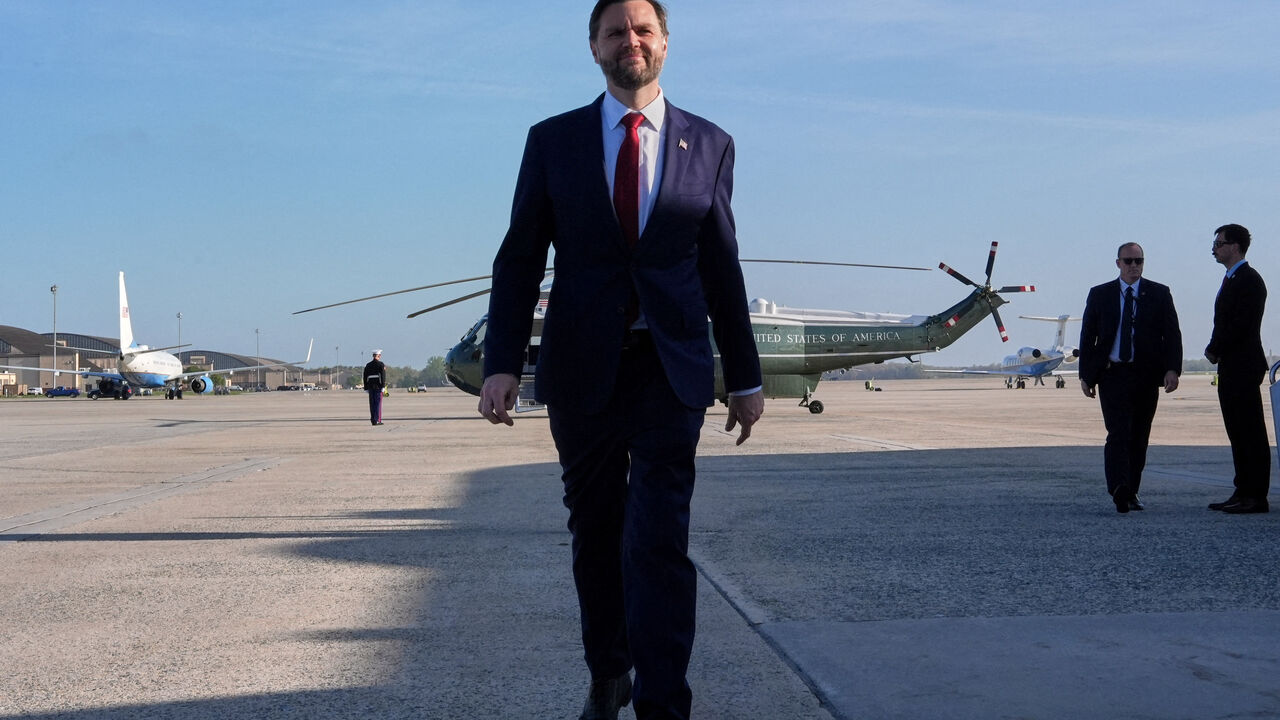 FILE PHOTO: U.S. Vice President JD Vance walks to speak to the media before boarding Air Force Two for expected departure to Pakistan for talks on Iran, at Joint Base Andrews, Maryland, U.S., April 10, 2026. Jacquelyn Martin/Pool via REUTERS/File Photo