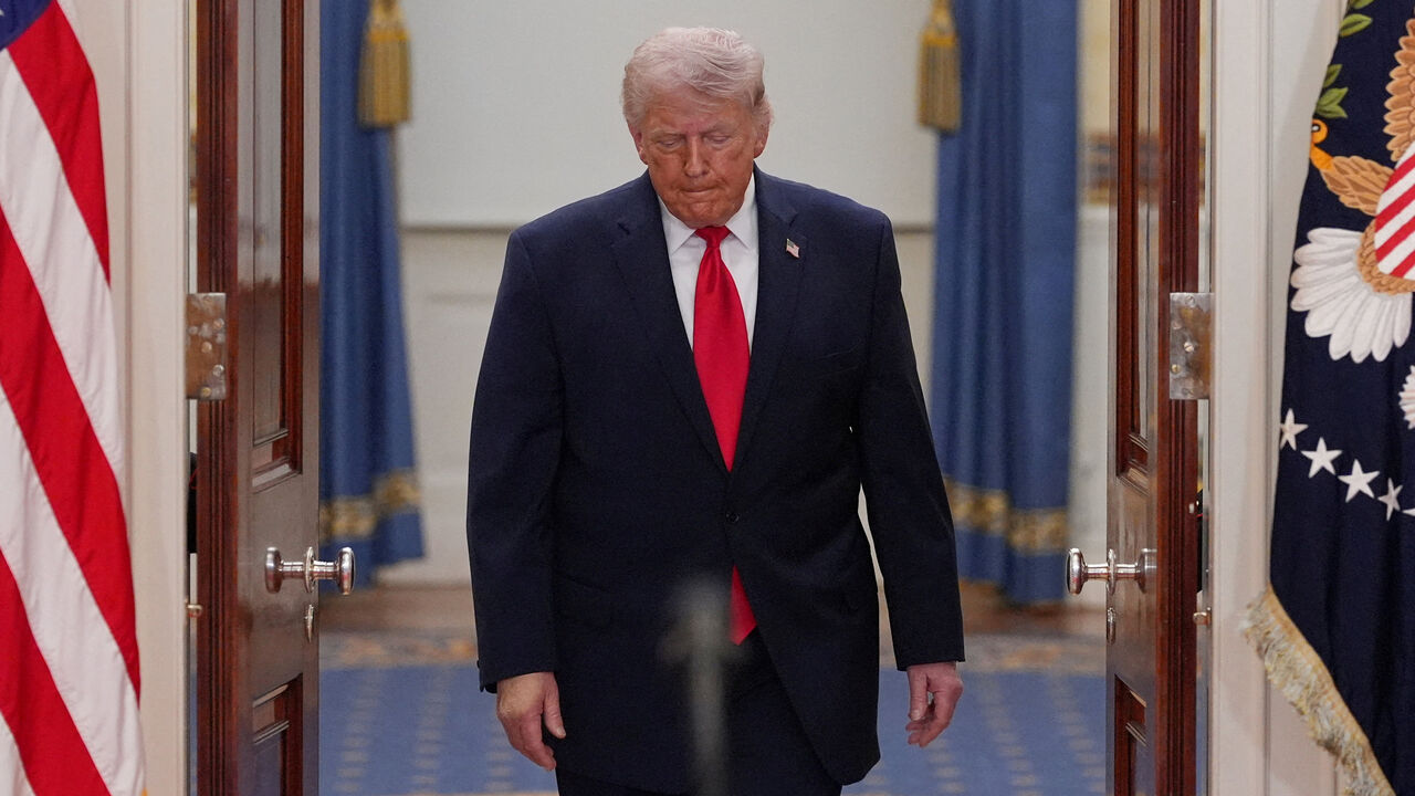 FILE PHOTO: President Donald Trump arrives to speak about the Iran war from the Cross Hall of the White House on Wednesday, April 1, 2026, in Washington.     Alex Brandon/Pool via REUTERS/File Photo