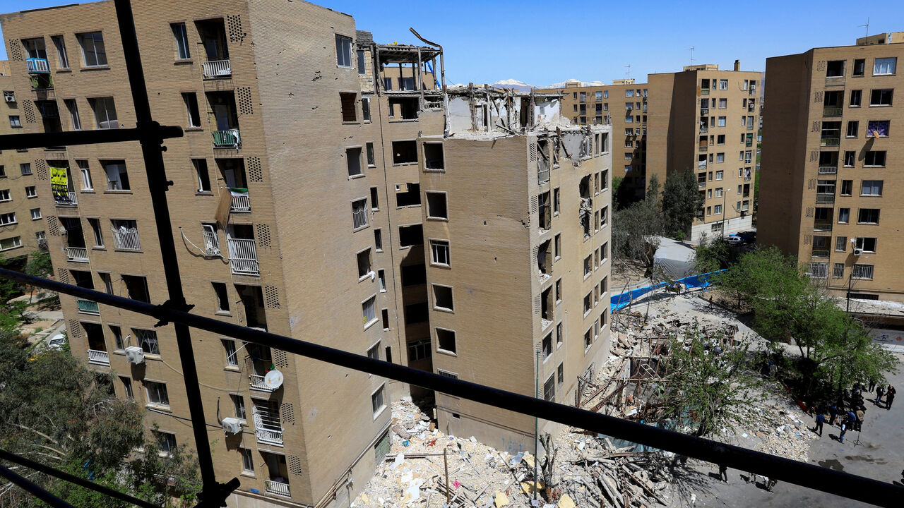 A residential building damaged by a strike on March 4, in Tehran, Iran, April 14, 2026. REUTERS/Thaier Al Sudani