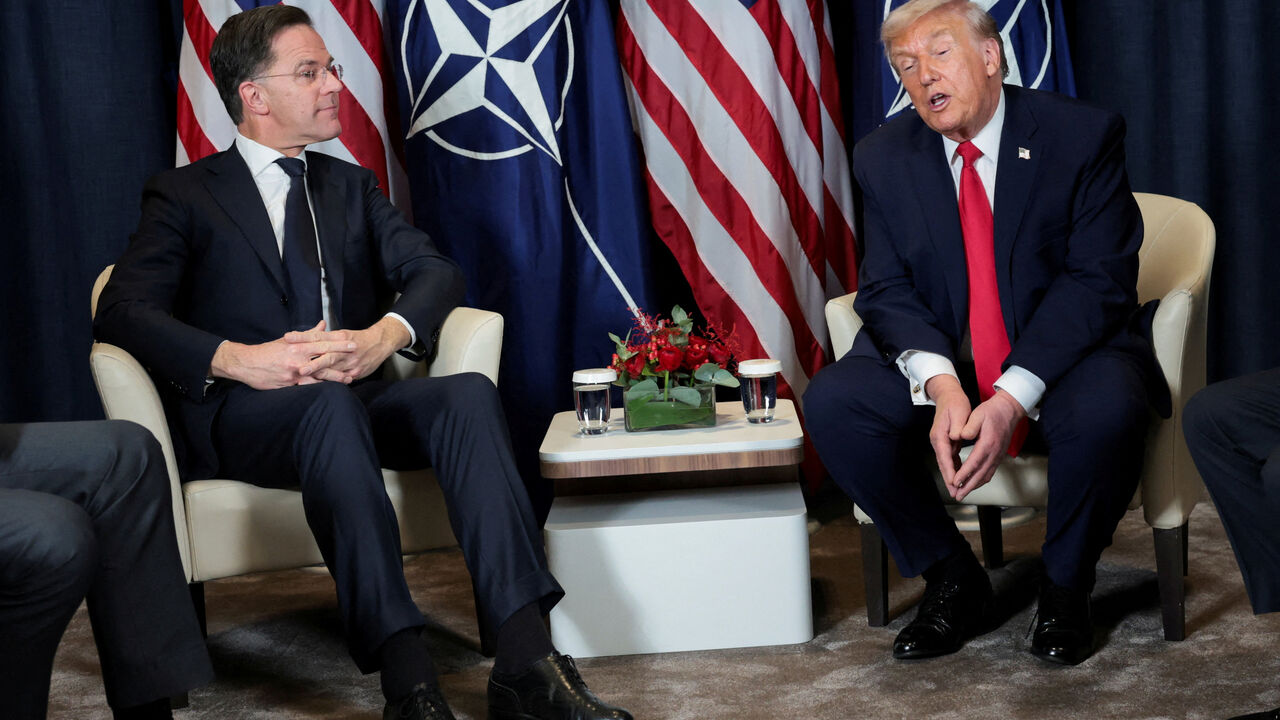 FILE PHOTO: U.S. President Donald Trump holds a bilateral meeting with NATO Secretary General Mark Rutte at the World Economic Forum (WEF) in Davos, Switzerland, January 21, 2026. REUTERS/Jonathan Ernst/File Photo