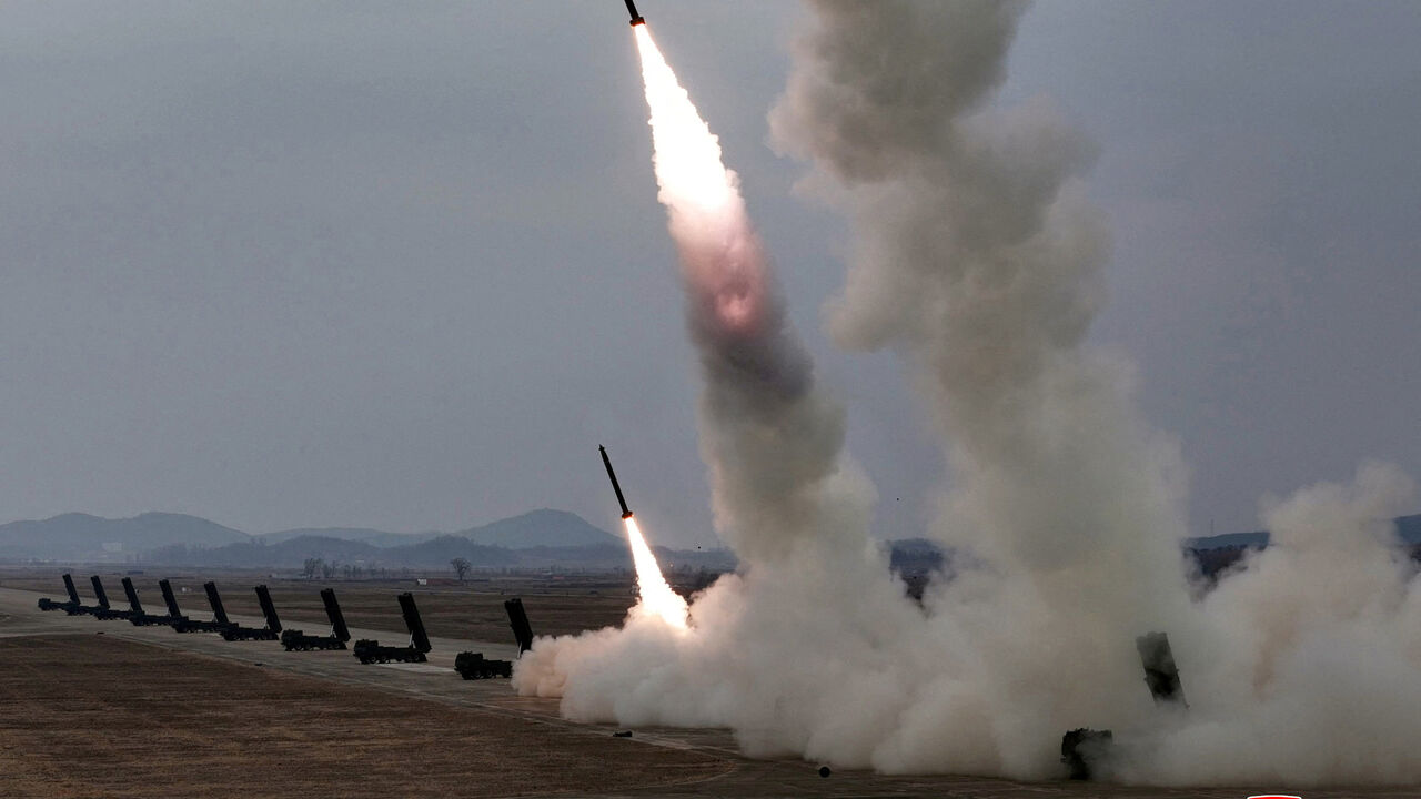 FILE PHOTO: A test-launch of 600 mm-calibre multiple rocket launchers is overseen by North Korean leader Kim Jong Un (not pictured), North Korea, March 14, 2026, in this picture released by North Korea's official Korean Central News Agency.  KCNA via REUTERS/File photo