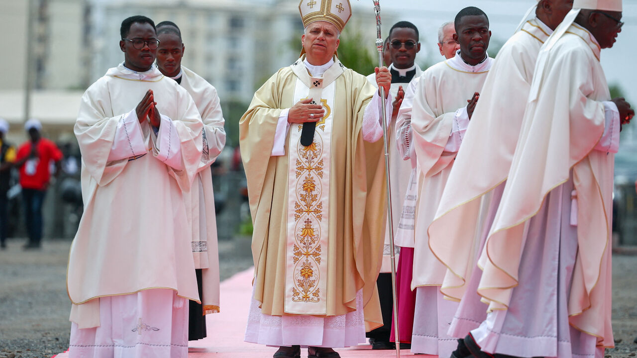 Pope Leo XIV arrives to lead a Holy Mass during his apostolic journey in Africa, in Kilamba, Luanda province, Angola, April 19, 2026. REUTERS/Guglielmo Mangiapane
