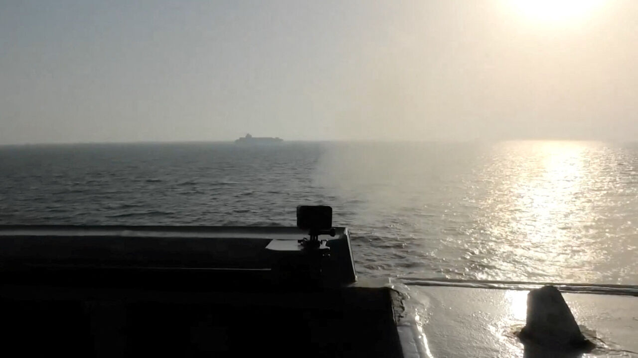 Smoke rises after USS Spruance (DDG 111) fired during the interception of Iranian-flagged cargo ship Touska in a location given as the north Arabian Sea, in this screen capture from a video released April 19, 2026. CENTCOM/Handout via REUTERS