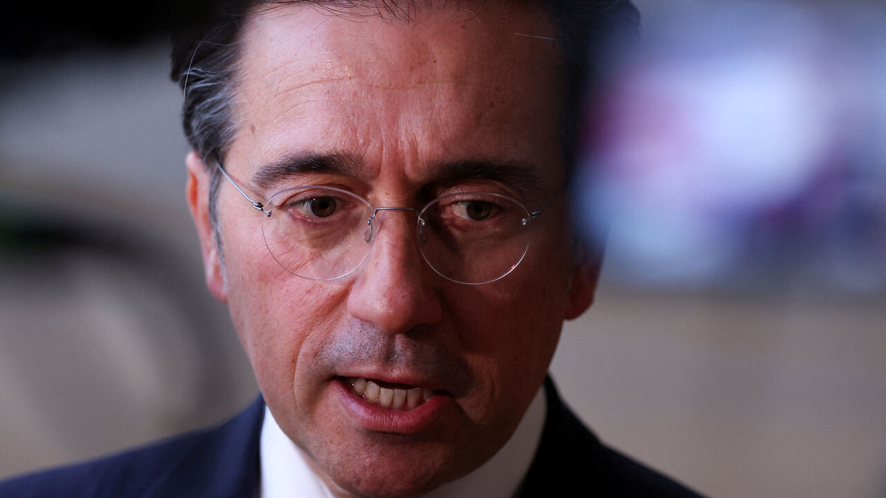 FILE PHOTO: Spanish Foreign Minister Jose Manuel Albares speaks to members of the media as he arrives to attend a European Union Energy and Foreign Affairs ministers meeting in Brussels, Belgium March 16, 2026. REUTERS/Omar Havana/File Photo