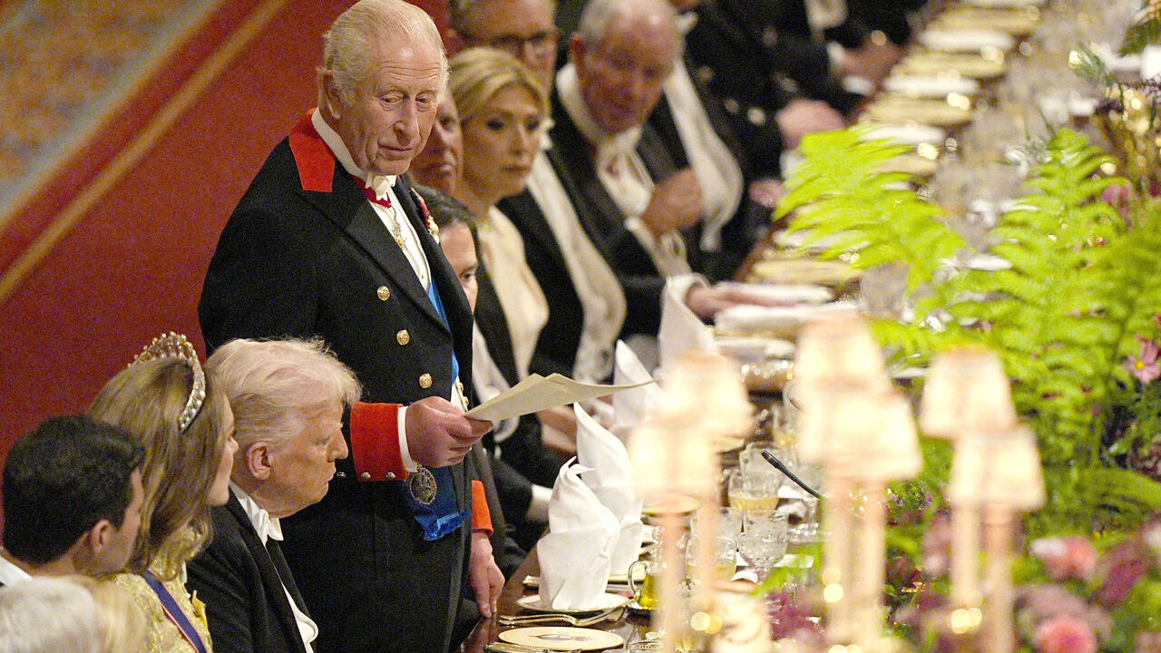 FILE PHOTO: U.S. President Donald Trump listens as Britain's King Charles speaks during the state banquet at Windsor Castle, Berkshire, on day one of US President Donald Trump and First Lady Melania Trump's second state visit to the UK, Wednesday September 17, 2025.    Aaron Chown/Pool via REUTERS/File Photo