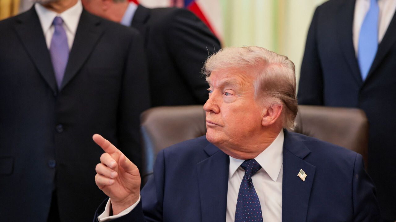 U.S. President Donald Trump points a finger as he participates in a healthcare affordability event in the Oval Office at the White House in Washington, D.C., U.S., April 23, 2026. REUTERS/Kylie Cooper
