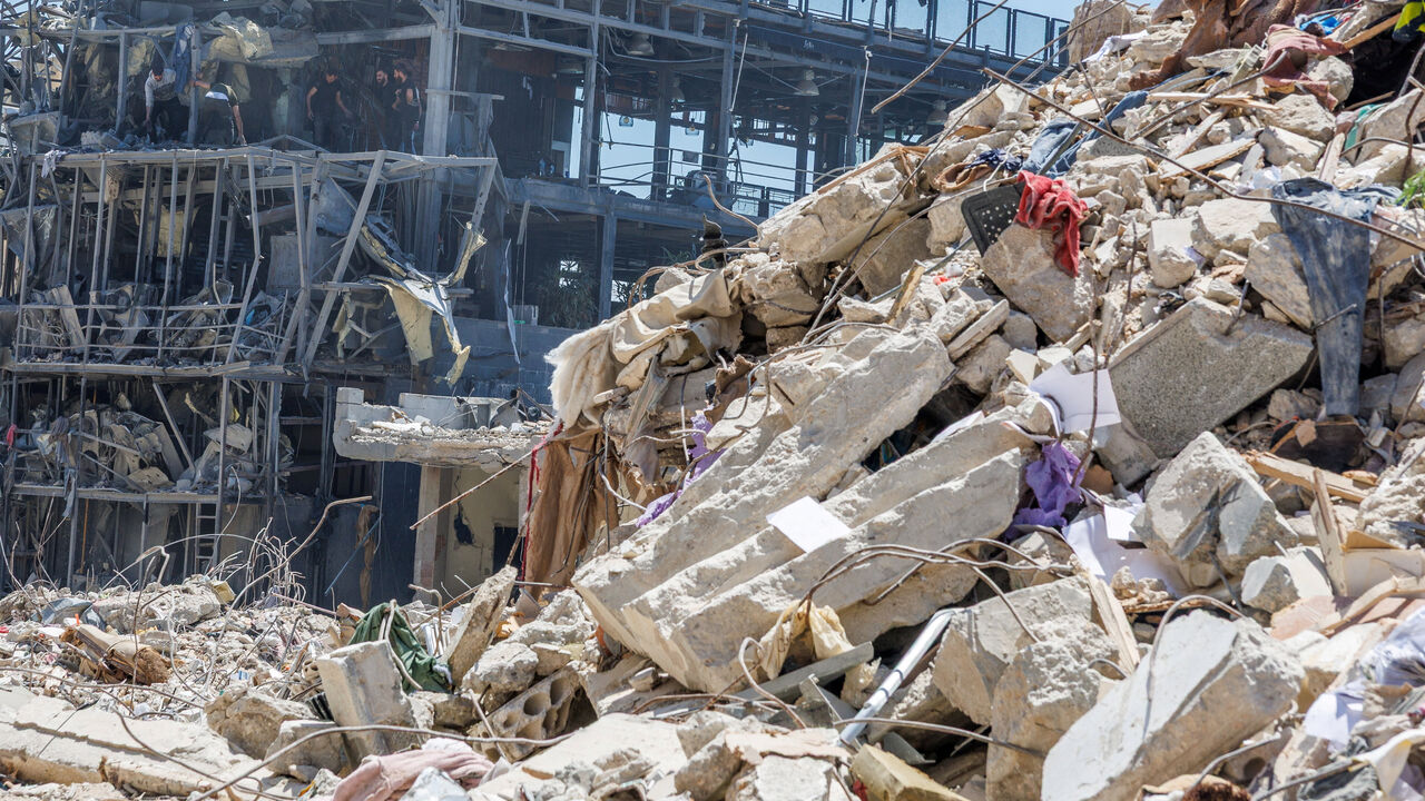 Workers clean a restaurant that was damaged by an Israeli strike, amid a temporary ceasefire between Lebanon and Israel, in Tyre, Lebanon, April 23, 2026. REUTERS/Zohra Bensemra/File Photo