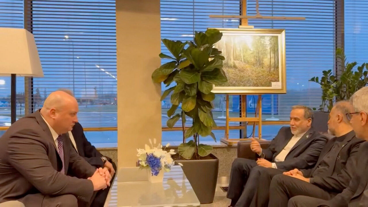 Iran's Foreign Affairs Minister Abbas Araqchi talks with officials, according to Iran's media, during his visit to Russia for talks with Russian President Vladimir Putin, in a place given as St. Petersburg, Russia, in this screenshot from a video released on April 27, 2026. Seyed Abbas Araghchi via Telegram/Handout via REUTERS