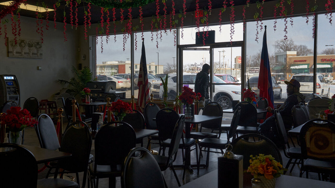 A customer exits Rose Goute Creole Restaurant, a Haitian restaurant, after a federal judge issued a temporary stay blocking the Trump administration’s attempt to strip Temporary Protected Status (TPS) for Haitian immigrants, in Springfield, Ohio, U.S., February 4, 2026. REUTERS/Bing Guan