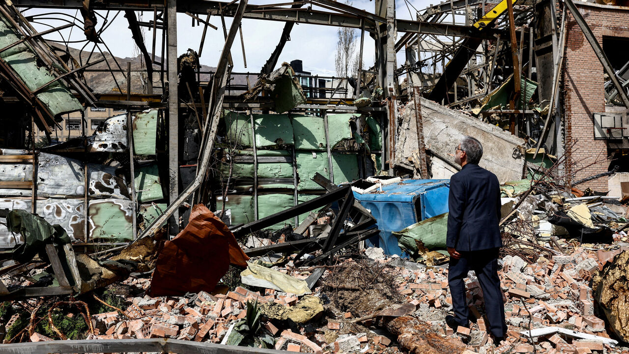 FILE PHOTO: Iran's Minister of Science Hossein Simaee Sarraf inspects the damage at the research building of the Shahid Beheshti University, which was damaged by a strike, amid the U.S.-Israeli conflict with Iran, in Tehran, Iran, April 4, 2026. Majid Asgaripour/WANA (West Asia News Agency) via REUTERS/File Photo