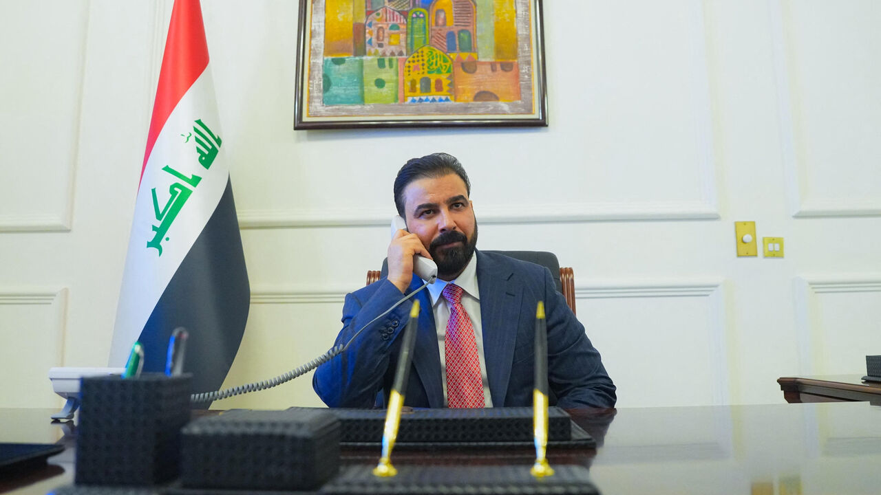 New Iraqi Prime Minister designate Ali al-Zaidi, uses a phone at his office in Baghdad, Iraq, April 28, 2026. Iraqi Prime Minister’s Media Office/Handout via REUTERS