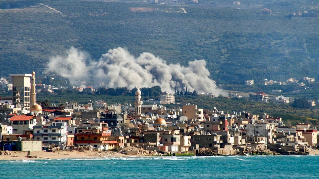 Smoke rises from the site of an Israeli airstrike on the Lebanese village of Qlaileh