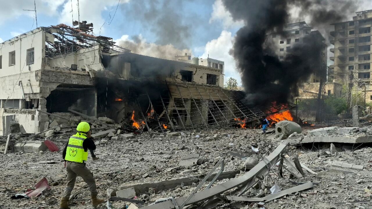 First responders at the site of an April 10, 2026 Israeli airstrike on the Lebanese State Security Center in the southern Lebanese city of Nabatieh