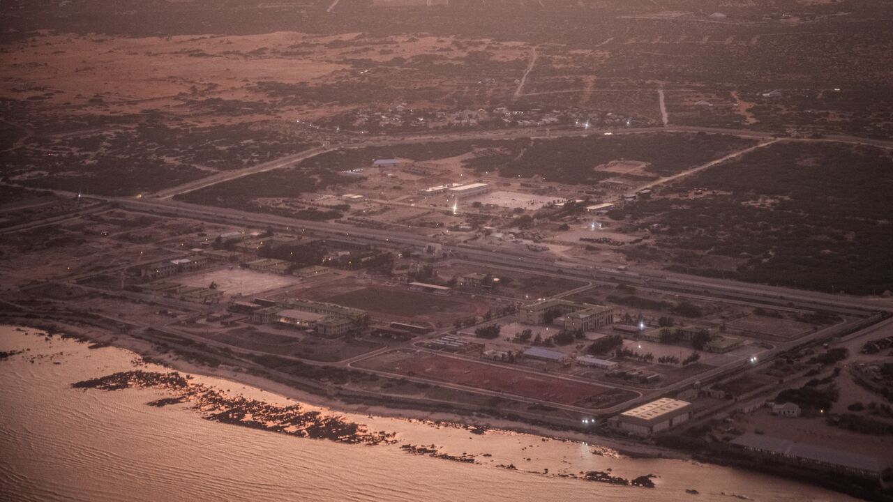 Turkey's Camp TURKSOM, a Turkish military base south of Mogadishu, is seen from the window of an aircraft, on April 26, 2025, in Mogadishu, Somalia. 