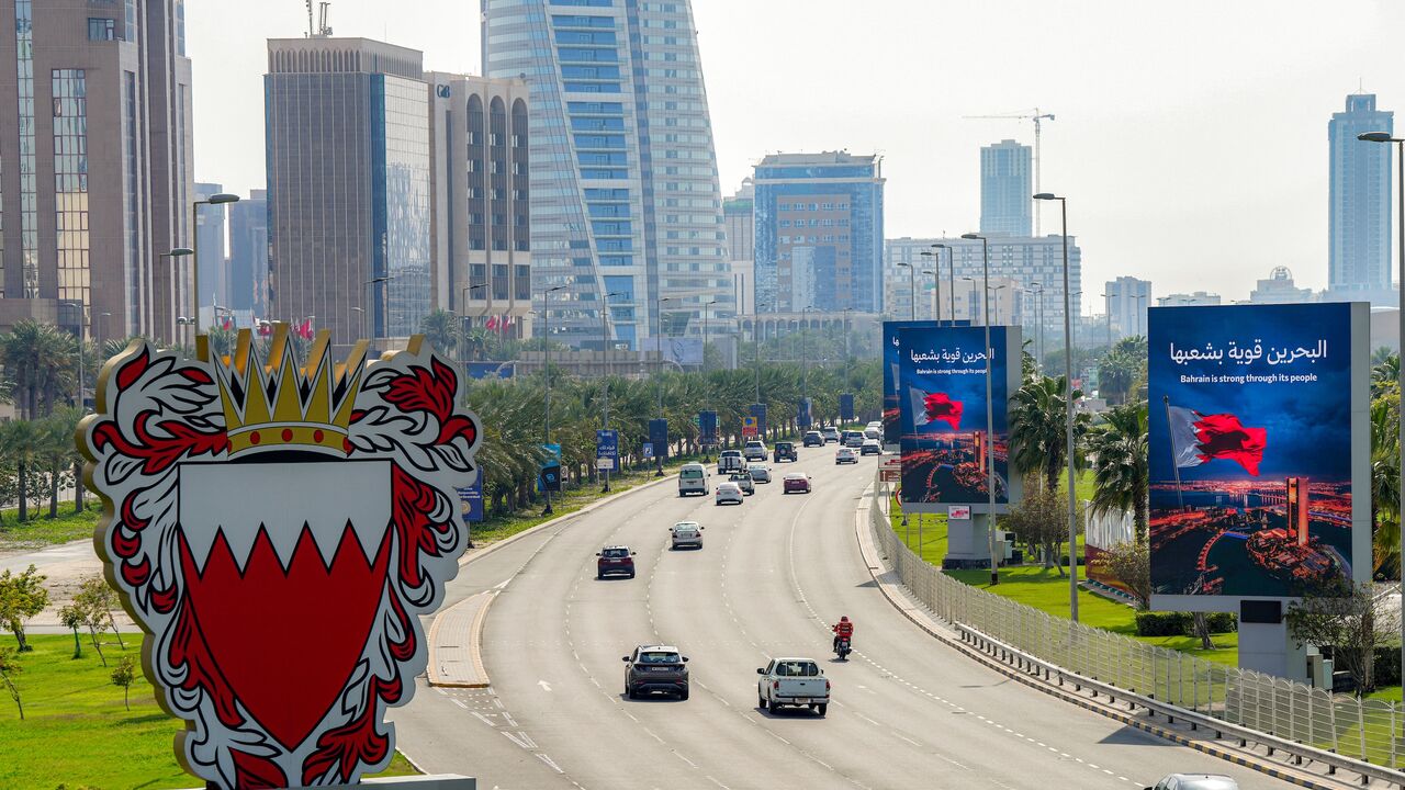 Vehicles move on a road in Bahrain's capital, Manama, on March 11, 2026. 
